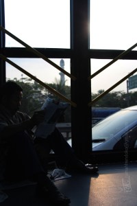 He's the Bus Crew who still had time to read news papper while the APTB Bus trying to drive through insane traffic of TOL of Jagorawi in the morning.