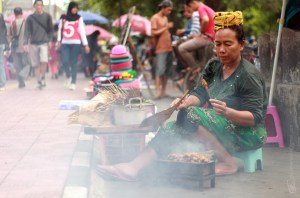 This is Sate, signature Indonesian culinary. She is one of Sate Seller in Malioboro Street of Yogyakarta.